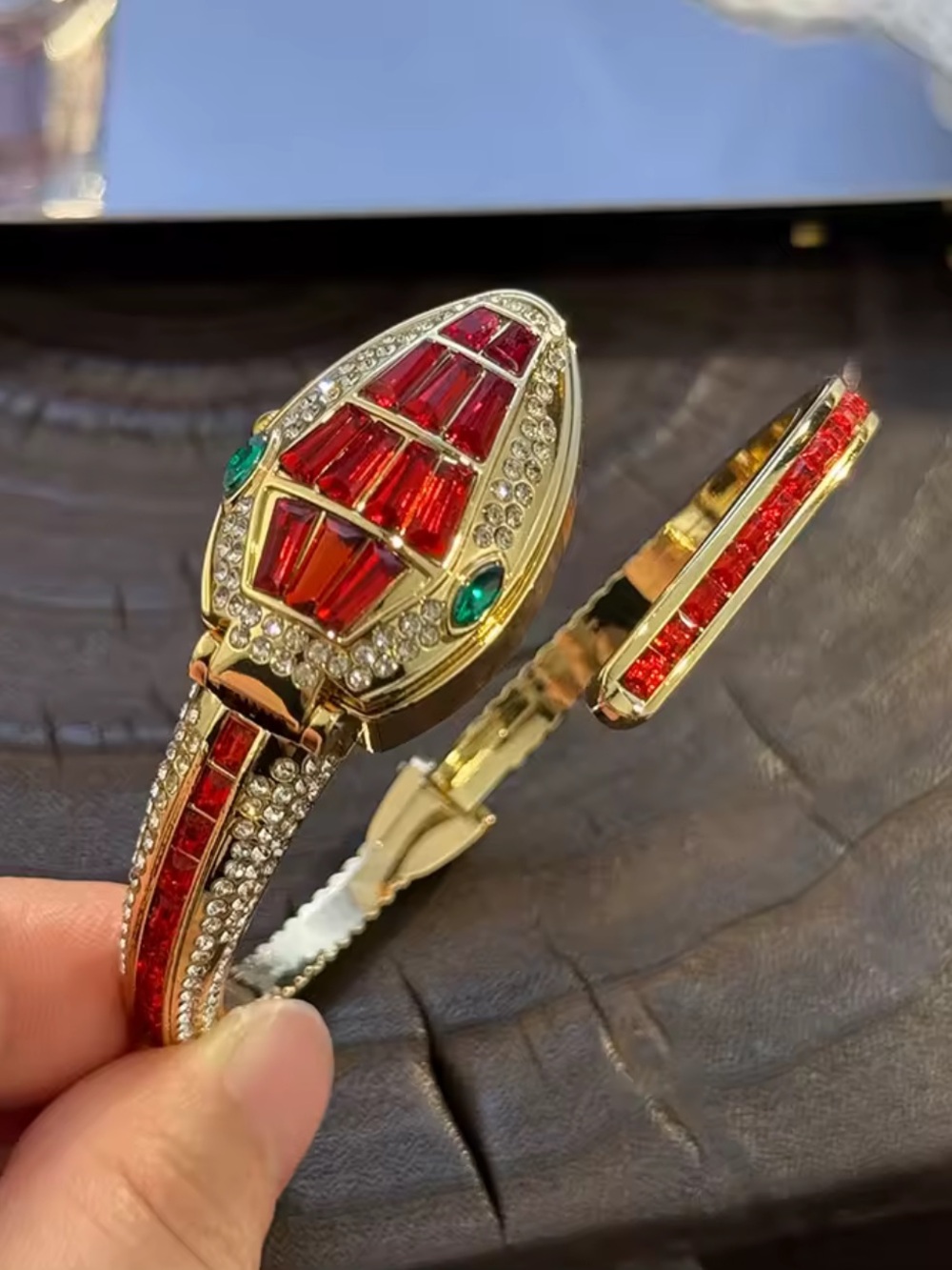 Macy's Gold Tone Bracelet Watch with Red and Green Stones